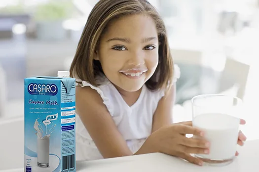 Girl enjoying a glass of Casaro milk